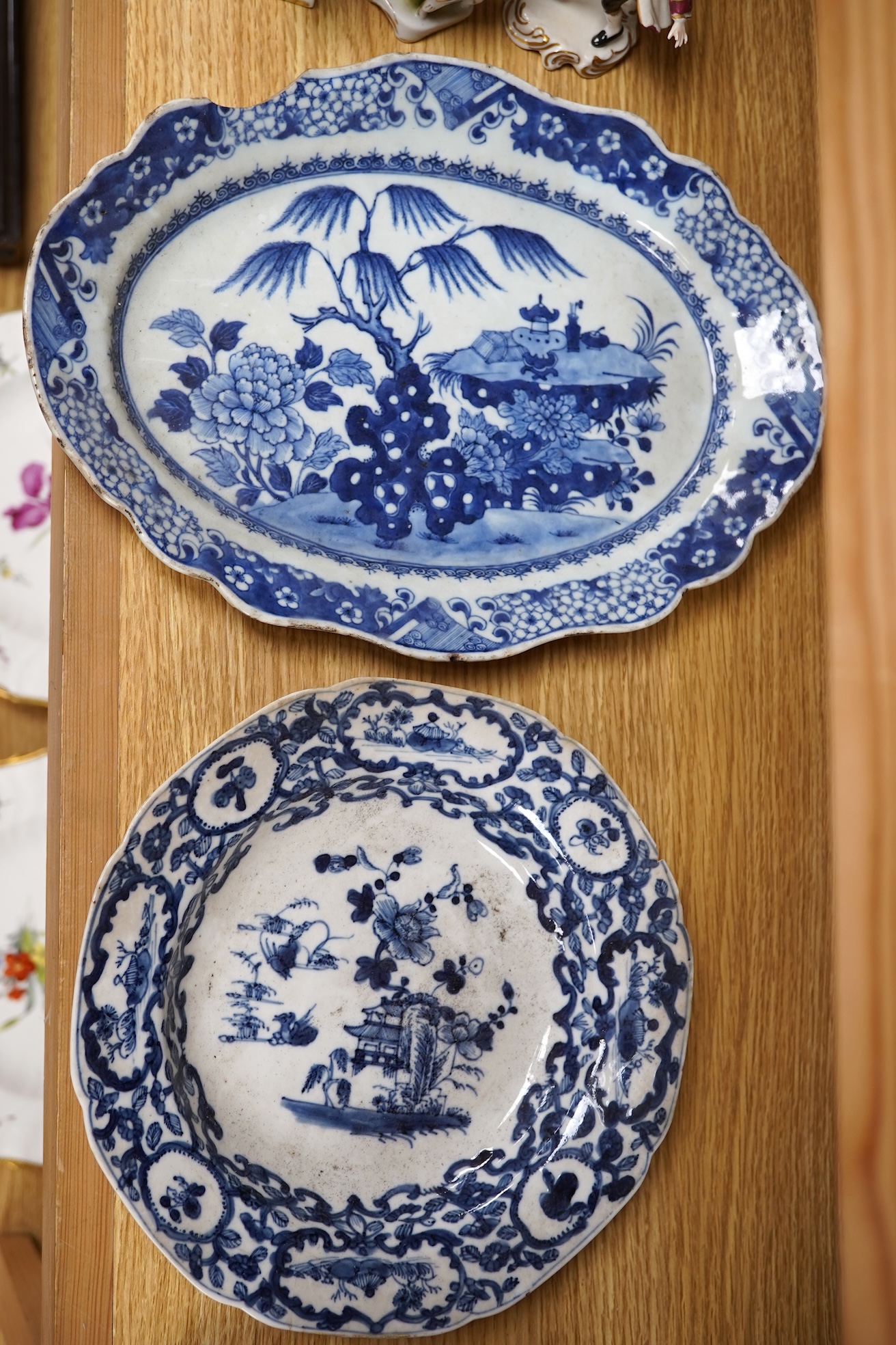 Two 18th century Chinese blue and white dishes, largest 31cm